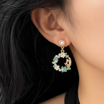 Aretes con perla, flores y mariposa